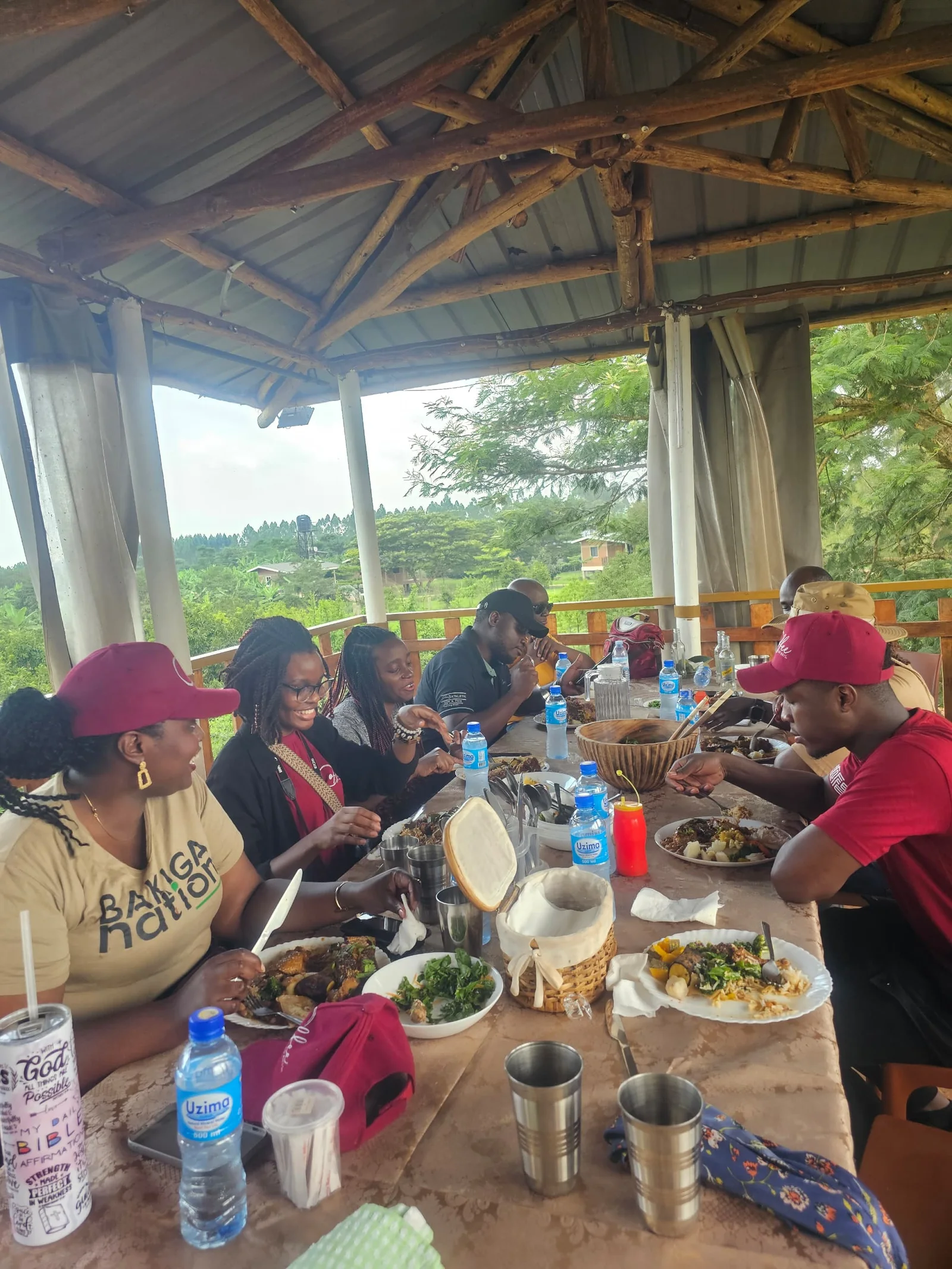 The safari group sharing a locally prepared lunch overlooking the farm